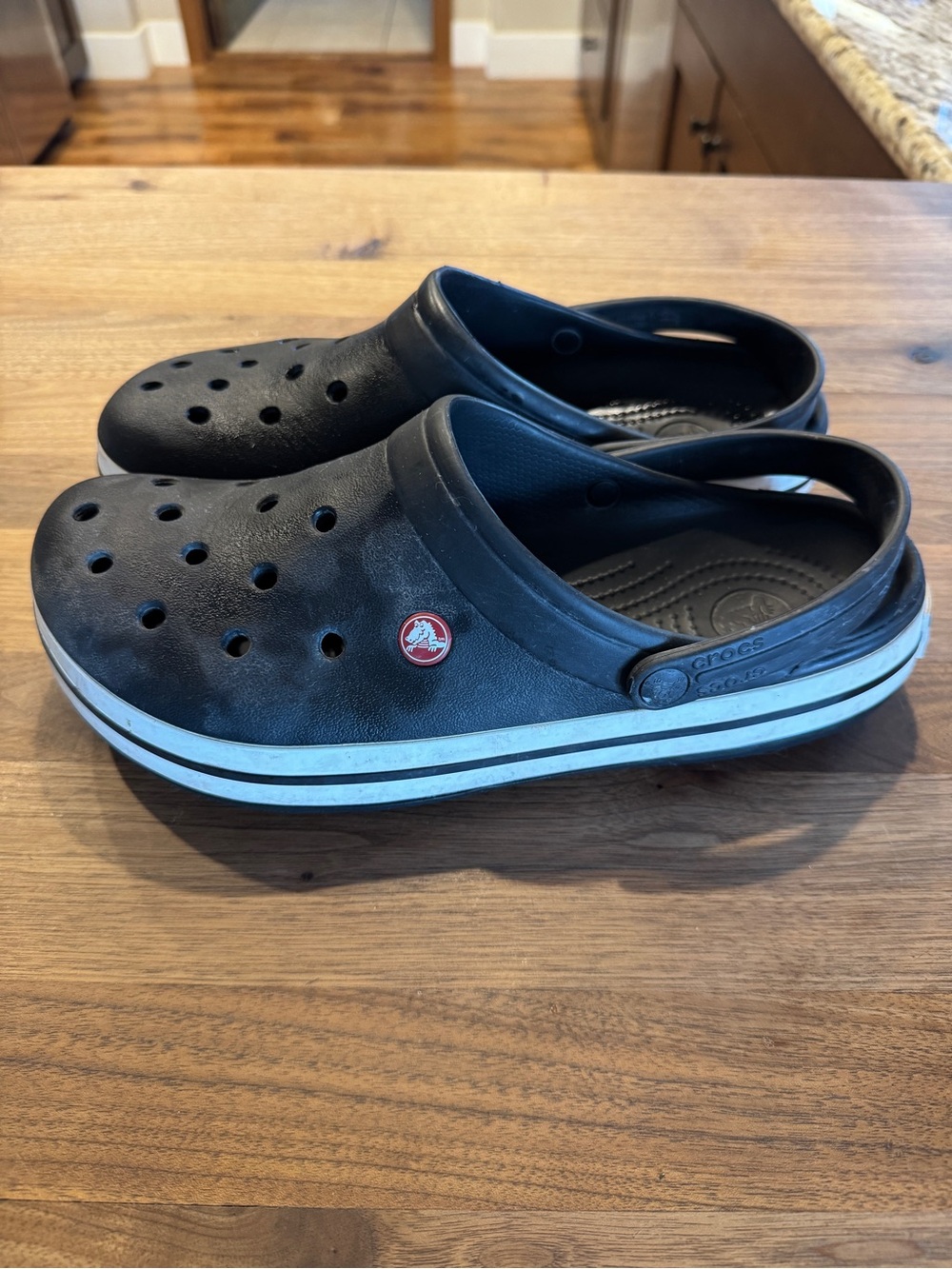 CROCS Black Clog Sandals with White Stripe